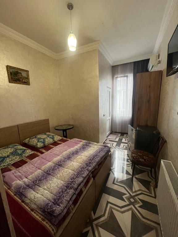 Postel nebo postele na pokoji v ubytování FIROSMANI house