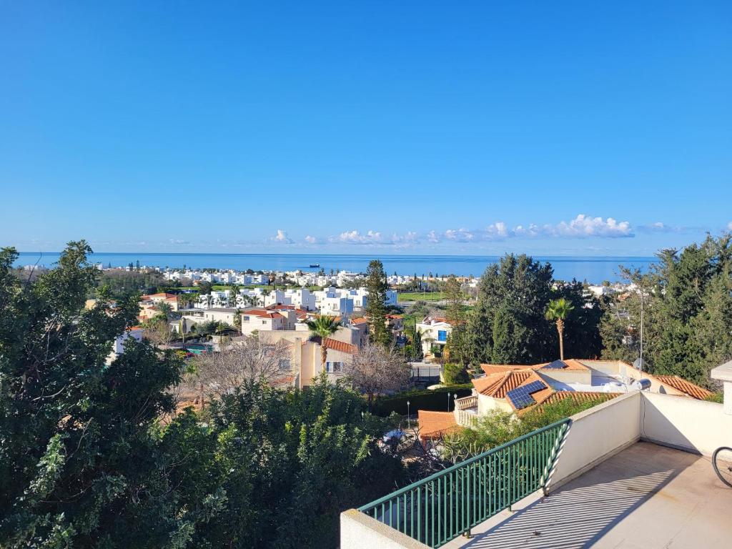 a view of the city from the balcony of a house at PJ's Apartment, Paphos, Cyprus in Khlorakas