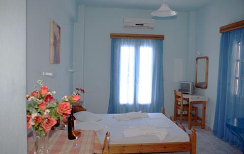 Una cama o camas en una habitación de Studio Mary