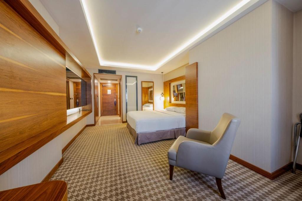 Postel nebo postele na pokoji v ubytování Anemon Kent Ankara Otel