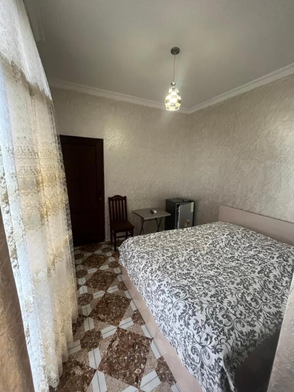 Postel nebo postele na pokoji v ubytování FIROSMANI house