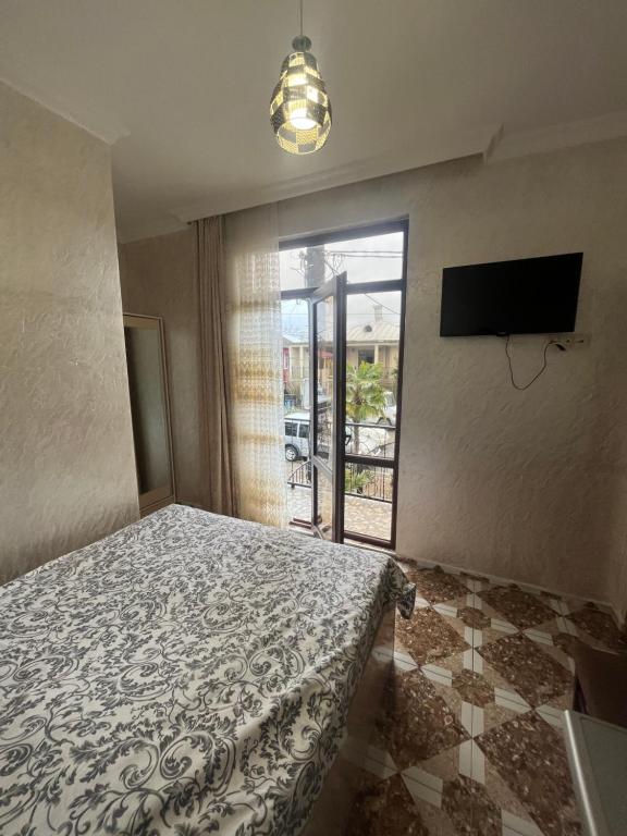Postel nebo postele na pokoji v ubytování FIROSMANI house