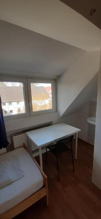 Postel nebo postele na pokoji v ubytování Low Budget Allach Apartmenthostel EVE 74