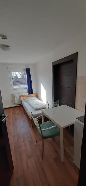 Postel nebo postele na pokoji v ubytování Low Budget Allach Apartmenthostel EVE 74