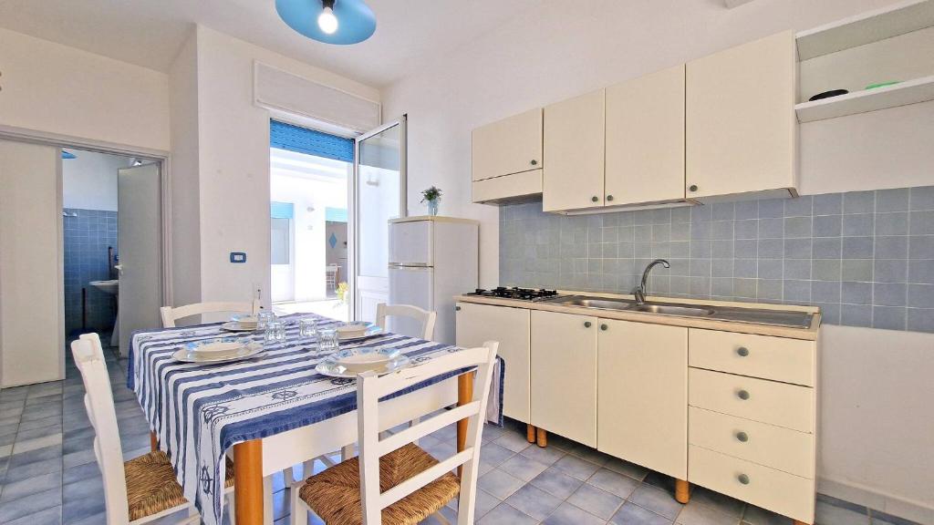Kuchyň nebo kuchyňský kout v ubytování Residence La Corte by Salento Affitti