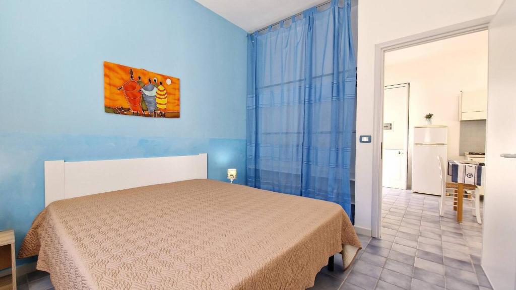 Postel nebo postele na pokoji v ubytování Residence La Corte by Salento Affitti