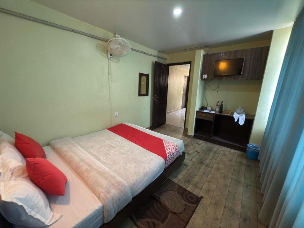 Postel nebo postele na pokoji v ubytování Hotel Arhant Inn