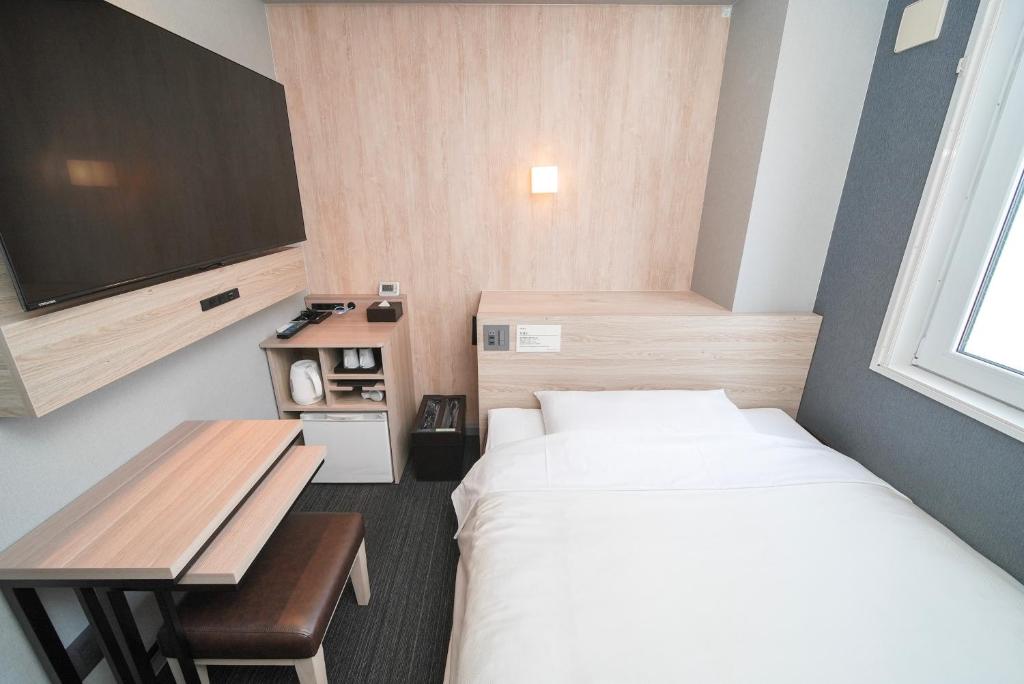 Kuchyň nebo kuchyňský kout v ubytování Super Hotel Hiroshima
