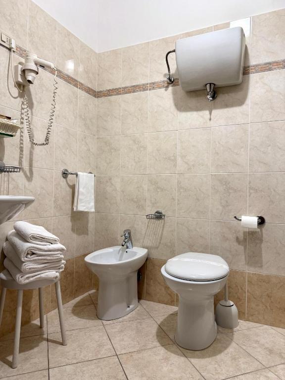 Koupelna v ubytování Grifone Hotel