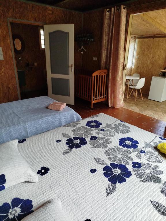 Postel nebo postele na pokoji v ubytování Ferme auberge le Ti'planteur