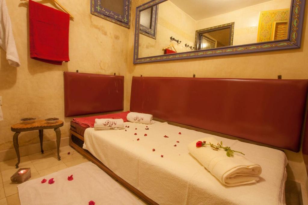 Letto o letti in una camera di Riad Alhambra