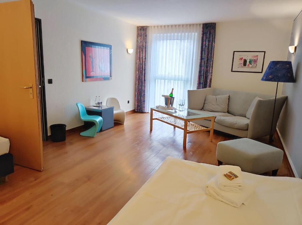 Posezení v ubytování ARVENA Kongress Hotel - Hotel in der Wagnerstadt