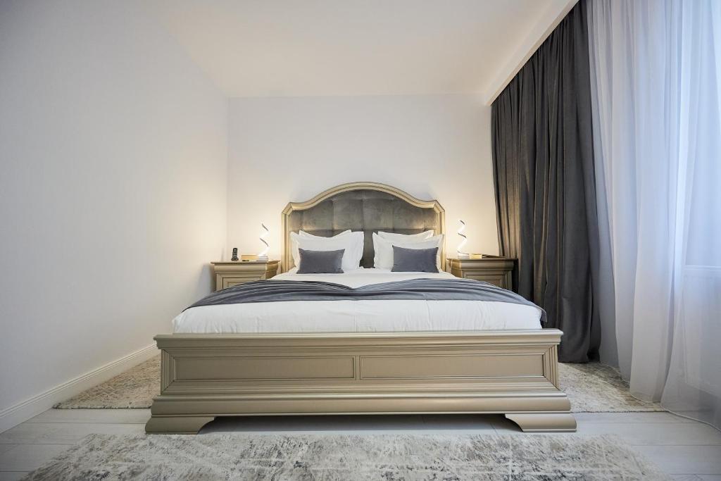 Postel nebo postele na pokoji v ubytování Lebada Luxury Resort & Spa