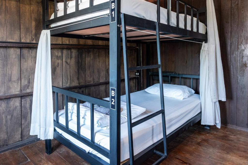 Postel nebo postele na pokoji v ubytování Moon Garden Hostel