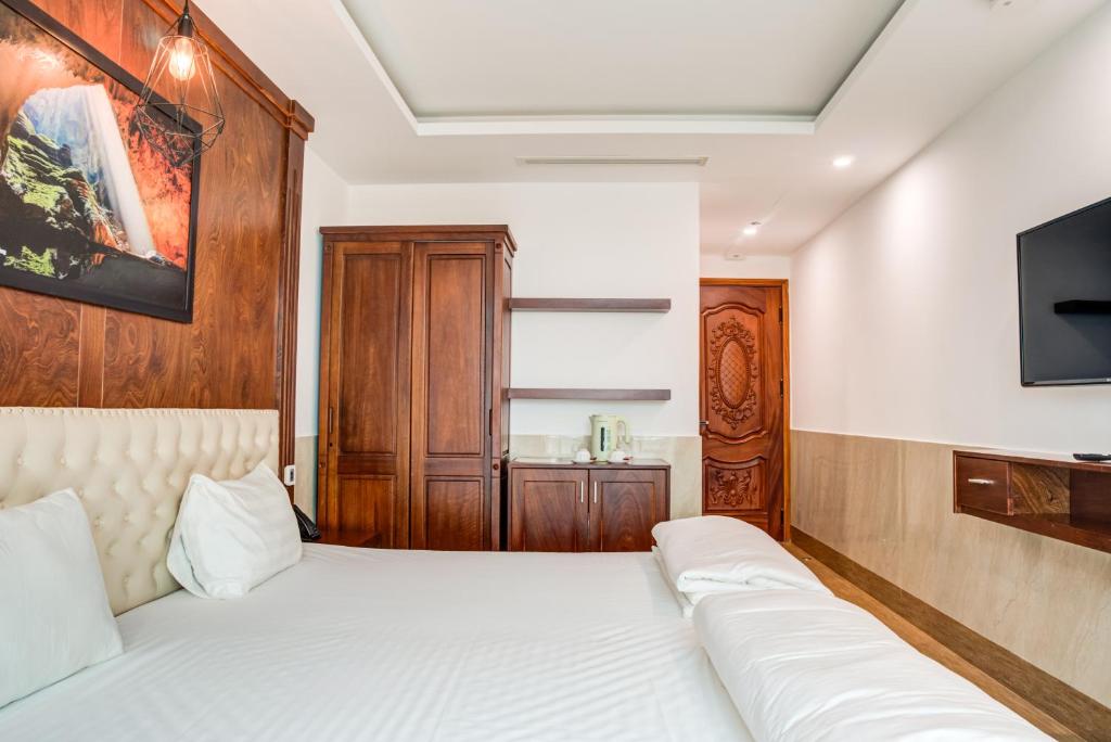 Postel nebo postele na pokoji v ubytování Phan Van 2 hotel
