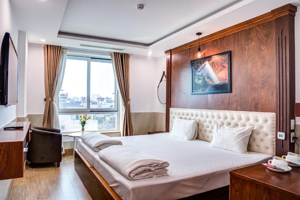 Postel nebo postele na pokoji v ubytování Phan Van 2 hotel