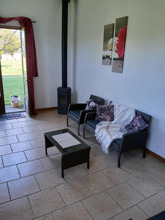 Posezení v ubytování Domaine des Ifs