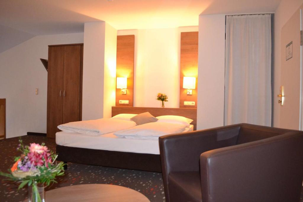 Postel nebo postele na pokoji v ubytování Best Western Hotel Erlangen