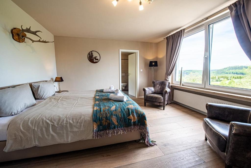 Postel nebo postele na pokoji v ubytování Landhotel Flora & Fauna