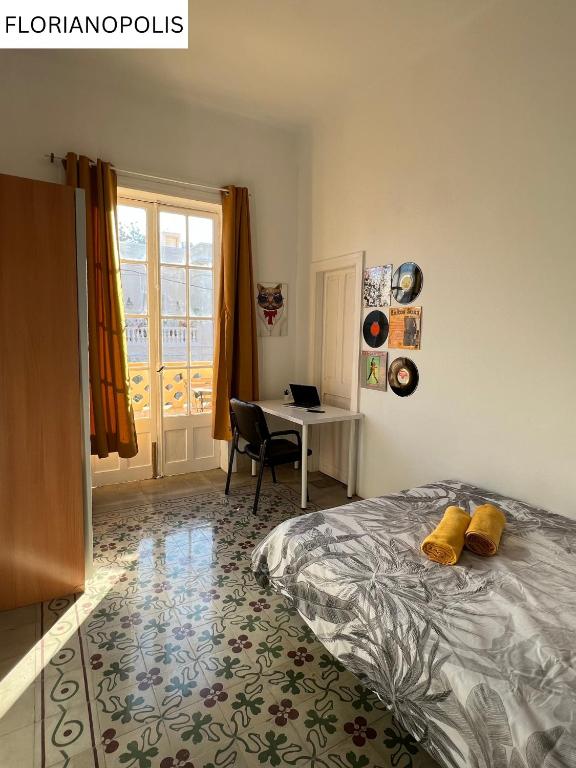 Postel nebo postele na pokoji v ubytování CoLiving Villa Brasil