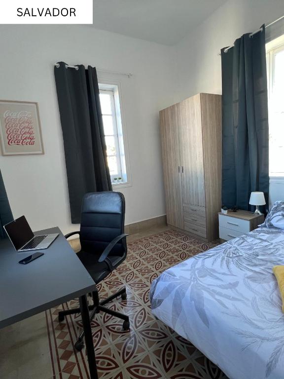 Postel nebo postele na pokoji v ubytování CoLiving Villa Brasil