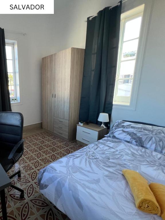 Postel nebo postele na pokoji v ubytování CoLiving Villa Brasil