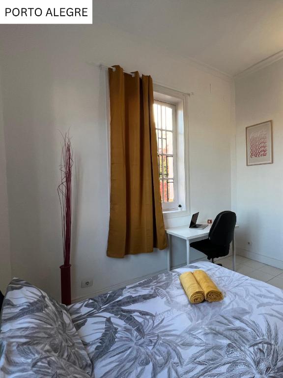 Postel nebo postele na pokoji v ubytování CoLiving Villa Brasil