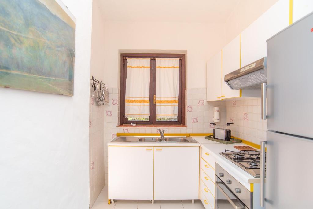 A kitchen or kitchenette at Villa Calipso