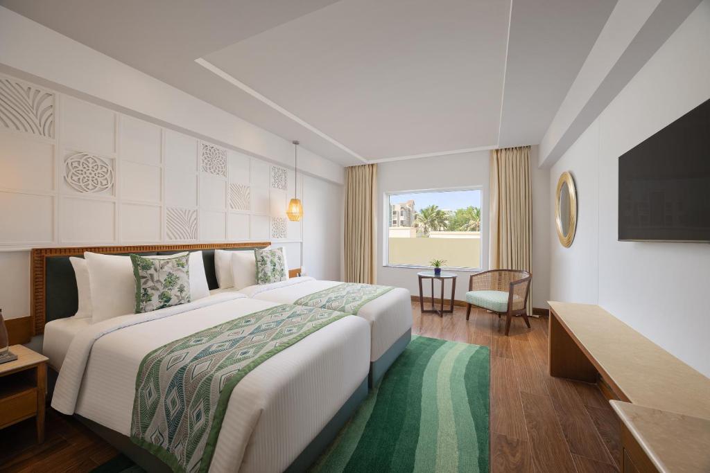 Postel nebo postele na pokoji v ubytování Fortune Beachfront, Puri - Member ITC Hotels' Group