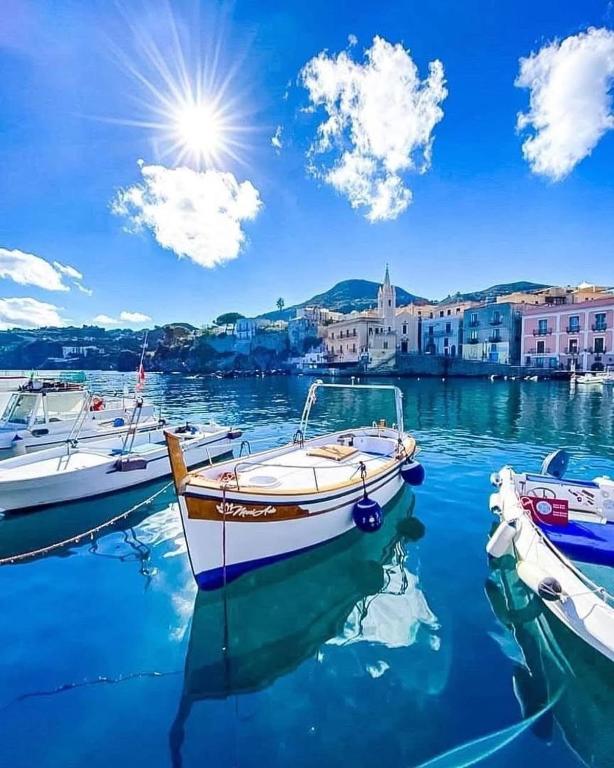 a group of boats docked in a harbor at Via Roma 55 in Lipari