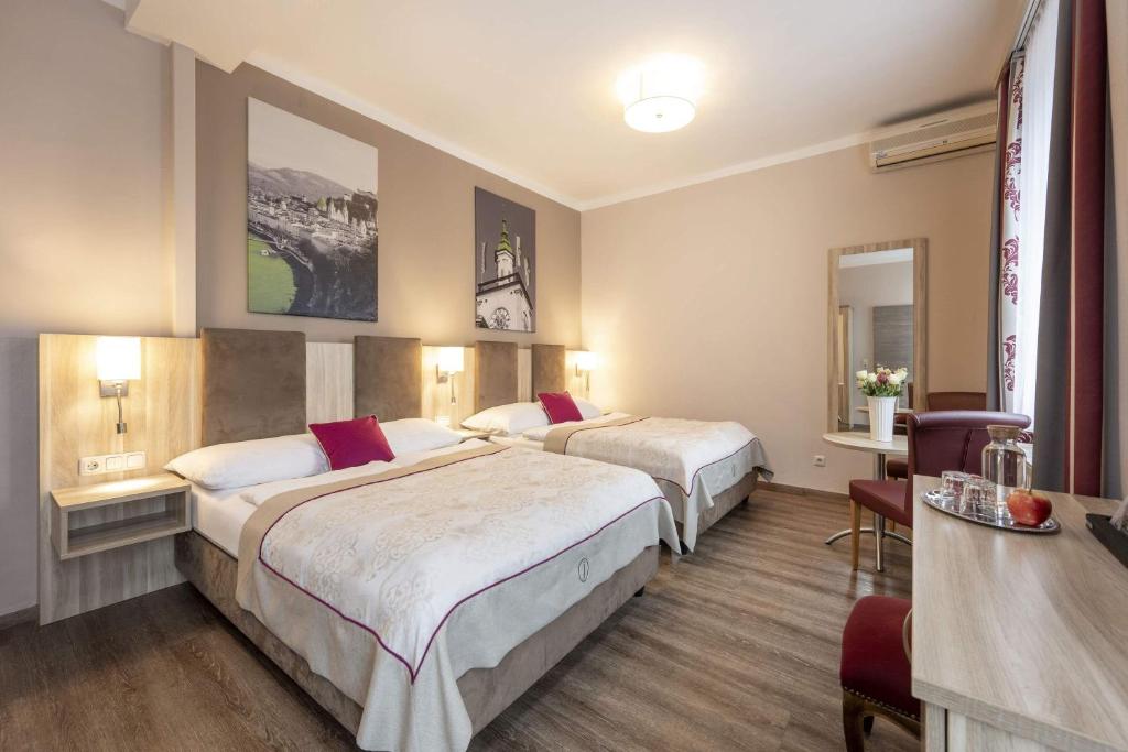 Posteľ alebo postele v izbe v ubytovaní HOTEL junior by MAX 70