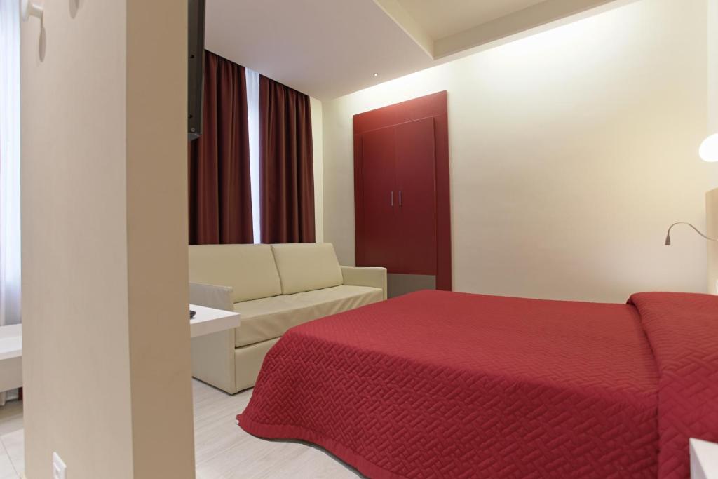 Postel nebo postele na pokoji v ubytování Hotel Agrigento Home