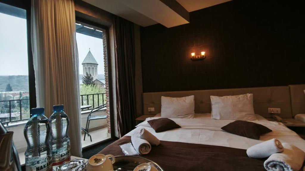 Postel nebo postele na pokoji v ubytování Hotel Voyager