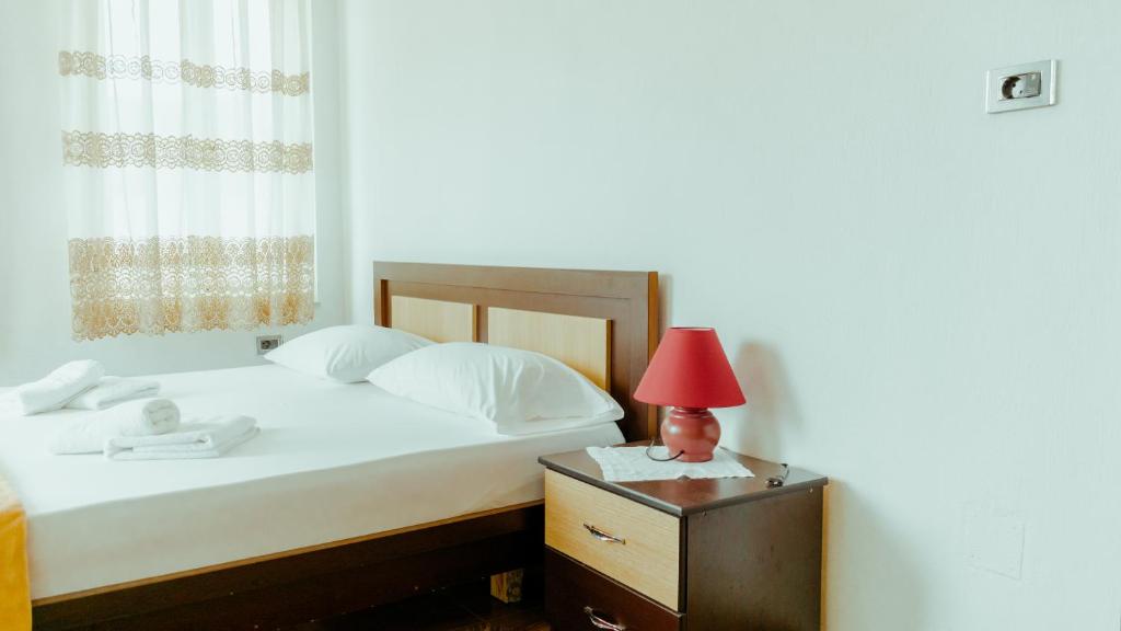 Postel nebo postele na pokoji v ubytování Guesthouse Shtino