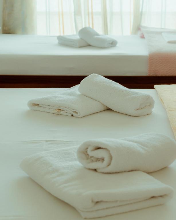 Postel nebo postele na pokoji v ubytování Guesthouse Shtino