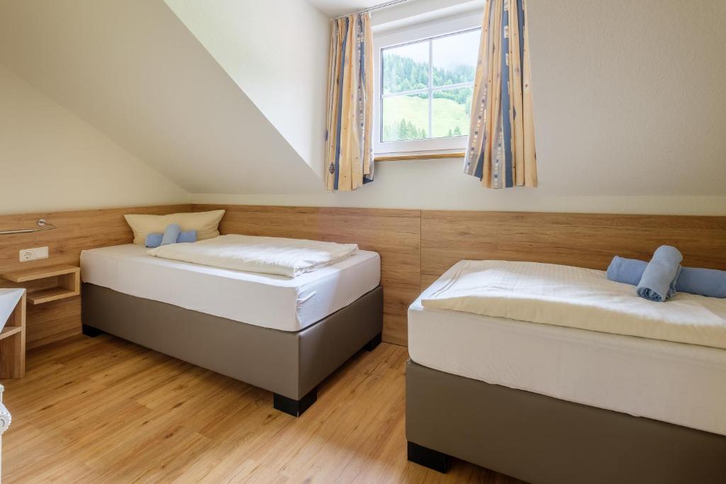 Postel nebo postele na pokoji v ubytování Gasthof Schwabenhof