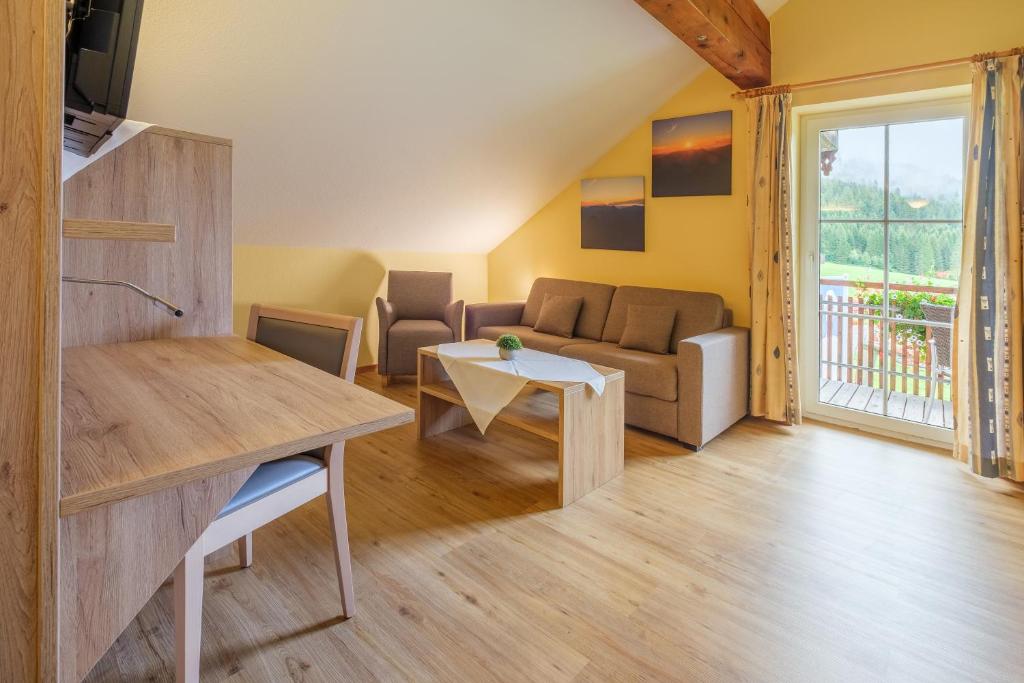 TV a/nebo společenská místnost v ubytování Gasthof Schwabenhof