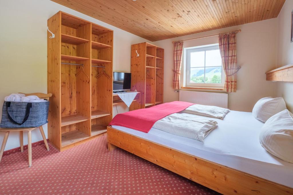 Postel nebo postele na pokoji v ubytování Gasthof Schwabenhof