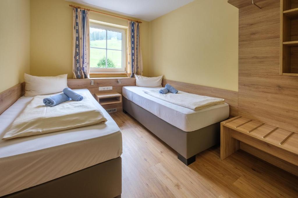Postel nebo postele na pokoji v ubytování Gasthof Schwabenhof