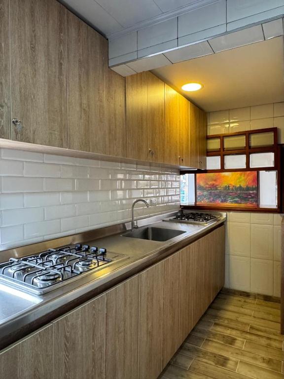 Kuchyň nebo kuchyňský kout v ubytování Hostelfc Marly