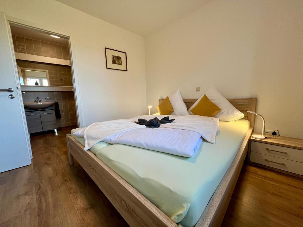 Postel nebo postele na pokoji v ubytování Aparthotel Tannenhof