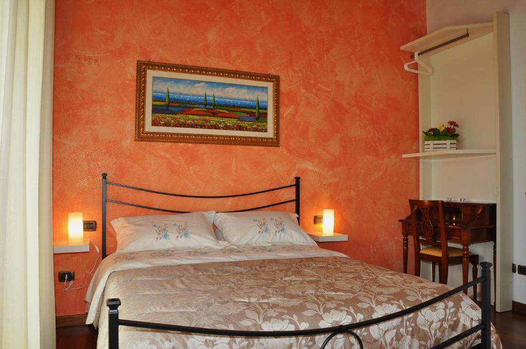 Postel nebo postele na pokoji v ubytování B&B Agrifoglio