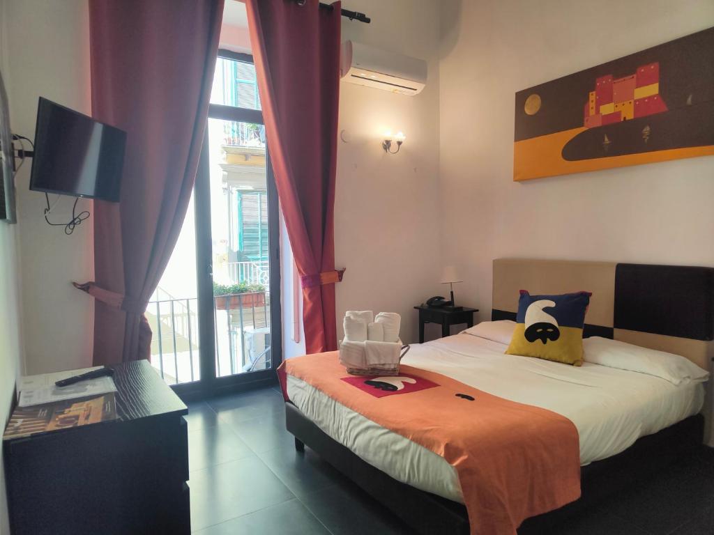 Postel nebo postele na pokoji v ubytování Hotel Plebiscito Aparthotel