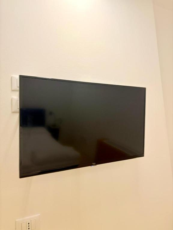 Telewizja i/lub zestaw kina domowego w obiekcie Nomad Hostel
