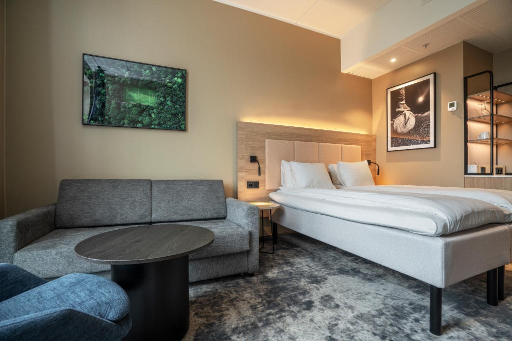 Postel nebo postele na pokoji v ubytování Thon Partner Hotel Ullevaal Stadion