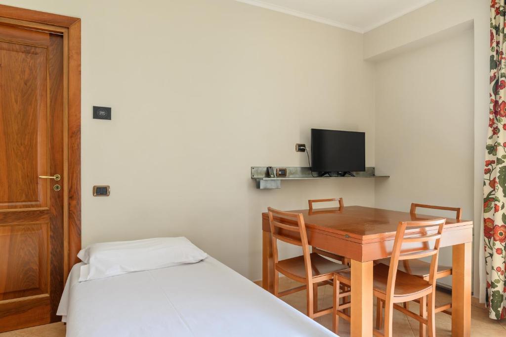 Telewizja i/lub zestaw kina domowego w obiekcie Crosti Apartments