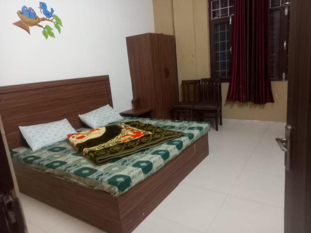 Voodi või voodid majutusasutuse Hotel Shree Ram toas
