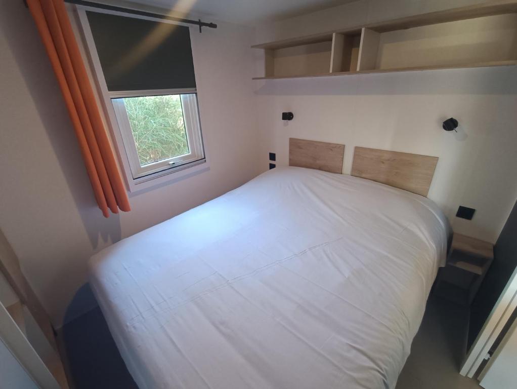 Postel nebo postele na pokoji v ubytování Camping Paris-Est