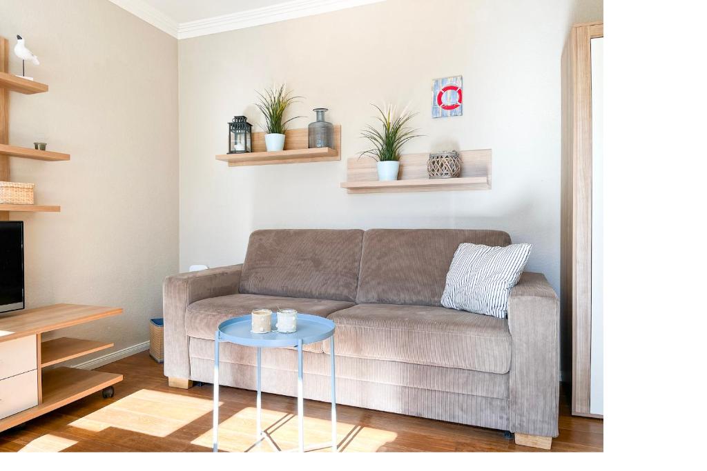 Χώρος καθιστικού στο Ferienhaus am Deich Wohnung 02