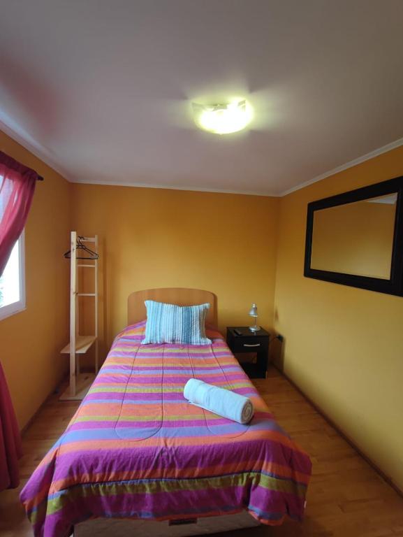 Postel nebo postele na pokoji v ubytování HOSTAL LA CASONA ALFREDO CAMPOS